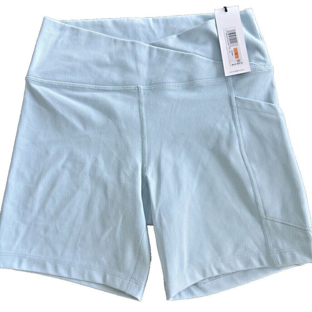 Calvin Klein Women's One Pocket Bike Shorts Crossover-Waistband Light Sea Blue S